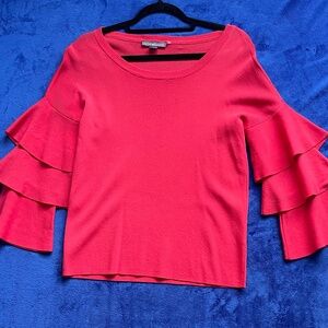 Berry red woman’s top with bell sleeves